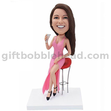 Custom Female Bobblehead Lady in Pink Dress Sitting on Bar Stool with Cocktail in Hand