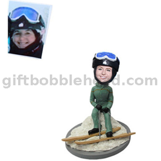 Female Skiing Bobblehead Lady Sitting on The Snowbank 2021
